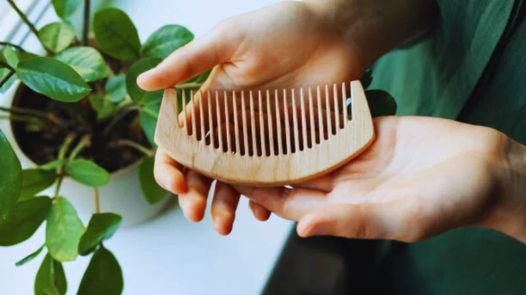 Wood comb for hair growth