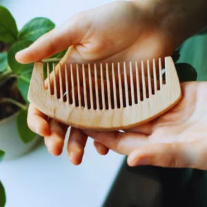 Wood comb for hair growth